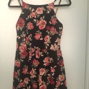 Black knee length dress with rose floral pattern